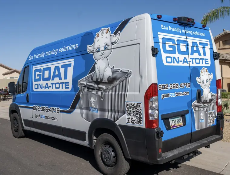 Goat on a Tote van in action, delivering reliable services to customers.